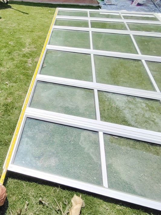 Used aluminium window frame and glass