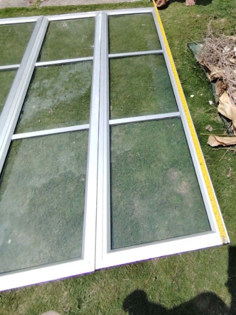 Used aluminium window frame and glass
