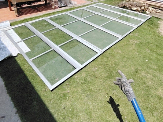 Used aluminium window frame and glass